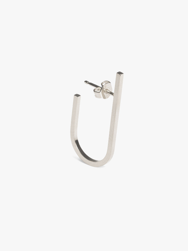 Earring Rivet silver, made by The Boyscouts.